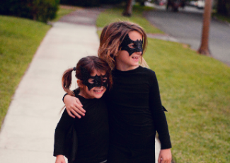 Kids Walking in Halloween Costumes