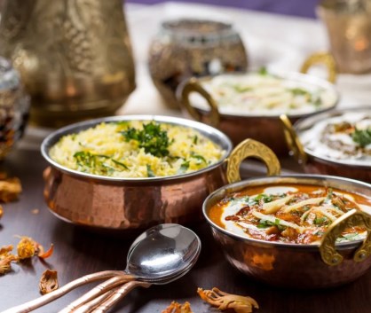 Bowls full of Indian food 