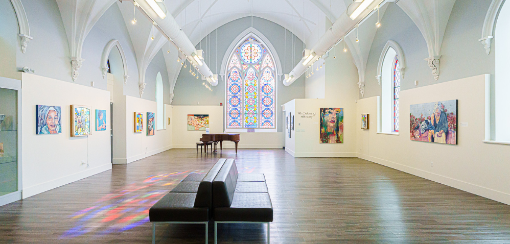 two women looking at art