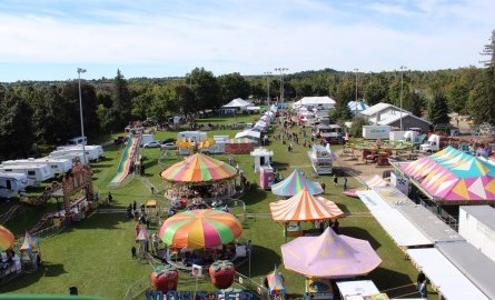 acton fall fair tents and crowd from above