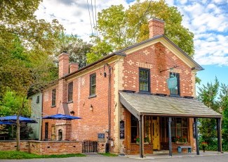 image of old brick building with outdoor patio