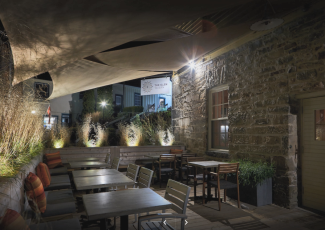 patio setting at night with lights